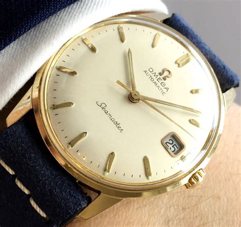 omega seamaster 18k gold vintage.